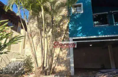 Casa com 3 dormitórios para alugar, 211 m² por r$ 7.500/mês - condomínio arujazinho iv - arujá/sp