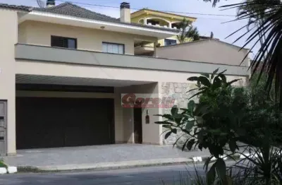 Casa com 3 dormitórios à venda, 280 m² por r$ 2.200.000,00 - condomínio country club - arujá/sp