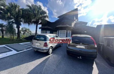 Casa com 4 dormitórios, 502 m² - venda por r$ 3.800.000,00 ou aluguel por r$ 14.000,01/mês - condomínio hills iii - arujá/sp