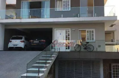 Casa com 3 dormitórios à venda, 489 m² por r$ 3.200.000,00 - condomínio arujá 5 - arujá/sp