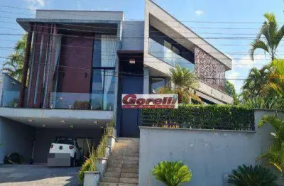 Casa com 4 suítes com armários à venda, 303 m² por r$ 6.600.000 - condomínio arujá 5 - arujá/sp