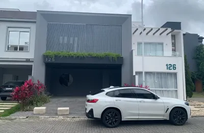 Belíssima casa em condomínio fechado no delta ville - biguaçú/sc.