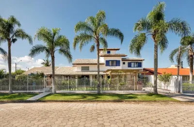 Belissima casa na praia da daniela com 5 suites. Oportunidade unica