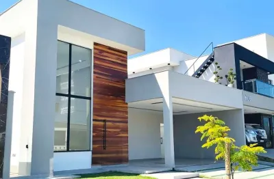 Casa em condomínio, com 3 suítes (1 closet), sala c/ pé direito alto, área gourmet c/ churrasqueira…