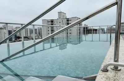 Apartamento 2 dormitórios 1 suíte na guilhermina, a 750m da praia por r$ 430mil