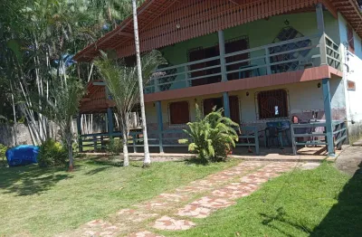 Sitío em outeiro a poucos metrós da praia, grande terreno com local natural