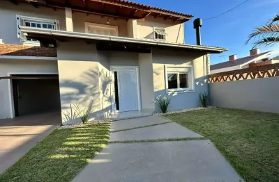 Casa com 4 quartos à venda na rua irmão florêncio, 198, harmonia, canoas por r$ 1.300.000