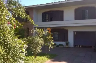 Casa com 5 quartos à venda na rua santa terezinha, 286, nossa senhora das graças, canoas por r$ 750.000