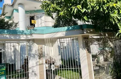 Casa com 4 quartos à venda na rua das bromélias, 259, loteamento bela vista, canoas por r$ 1.170.000
