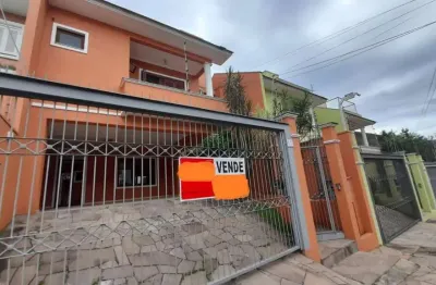 Casa com 3 quartos à venda na rua bélgica, 65, marechal rondon, canoas por r$ 1.170.000