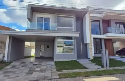 Casa em condomínio fechado com 3 quartos à venda na rua dos pinheiros, 141, igara, canoas por r$ 1.980.000