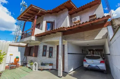 Casa com 3 quartos à venda na rua martinho lutero, 88, harmonia, canoas por r$ 610.000