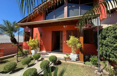 Casa à venda em canudos, novo hamburgo - 3 quartos, 3 banheiros, suíte e 3 vagas de garagem