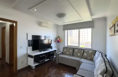 Apartamento mobiliado de 71m², com 2 dormitórios, sendo 1 suíte e vaga no centro