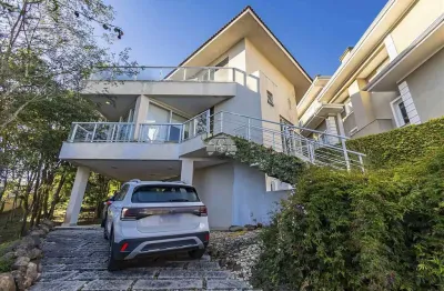 Casa em condomínio fechado com 4 quartos à venda na rua prodócimo lago, 1281, taboão, curitiba, 389 m2 por r$ 1.850.000