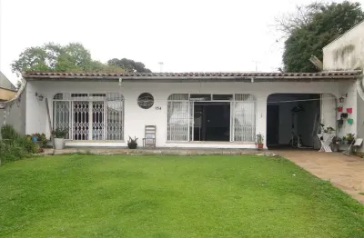 Casa com 3 quartos à venda na rua duarte da costa, 154, guaíra, curitiba, 120 m2 por r$ 700.000