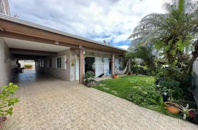 Casa com 5 quartos à venda na rua odilon santana gomes, 41, costa azul, matinhos, 376 m2 por r$ 1.349.900