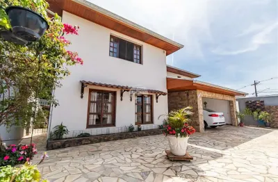 Casa com 4 quartos à venda na rua monte castelo, 1321, tarumã, curitiba, 226 m2 por r$ 1.448.000
