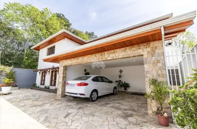 Casa com 4 quartos à venda na rua monte castelo, 1321, tarumã, curitiba, 226 m2 por r$ 1.448.000