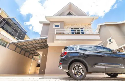 Casa com 4 quartos à venda na Rua Adolfo Pikussa, 163, Uberaba, Curitiba, 124 m2 por R$ 799.000