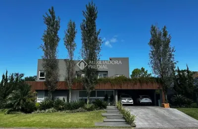 Casa em condomínio fechado com 4 quartos à venda na avenida juca batista, 8000, ponta grossa, porto alegre, 478 m2 por r$ 4.200.000