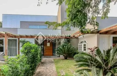 Casa em condomínio fechado com 5 quartos à venda na avenida coronel marcos, 1334, pedra redonda, porto alegre, 320 m2 por r$ 2.100.000