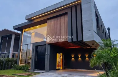 Casa em condomínio fechado com 5 quartos à venda na rua andira, 12, velas da marina, capão da canoa, 240 m2 por r$ 5.500.000