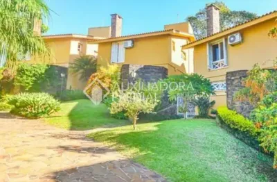 Casa em condomínio fechado com 3 quartos à venda na rua professor carlos de paula couto, 500, cavalhada, porto alegre, 240 m2 por r$ 1.300.000