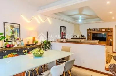 Casa em condomínio fechado com 3 quartos à venda na rua francisco solano borges, 200, hípica, porto alegre, 200 m2 por r$ 990.000