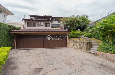 Casa com 4 quartos à venda na rua joão paetzel, 173, chácara das pedras, porto alegre, 356 m2 por r$ 2.195.000