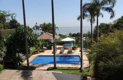 Casa com 4 quartos à venda na avenida guaíba, 3090, vila assunção, porto alegre, 600 m2 por r$ 3.500.000