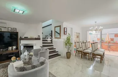 Casa em condomínio fechado com 3 quartos à venda na rua doutor barbosa gonçalves, 230, chácara das pedras, porto alegre, 186 m2 por r$ 1.390.000