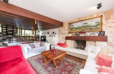 Casa com 5 quartos à venda na rua gustavo schmidt, 125, três figueiras, porto alegre, 588 m2 por r$ 3.800.000