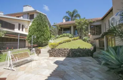 Casa em condomínio fechado com 4 quartos à venda na avenida da cavalhada, 5205, cavalhada, porto alegre, 910 m2 por r$ 2.250.000