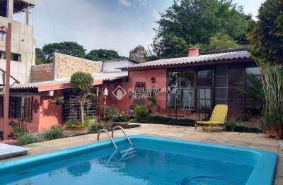 Casa com 4 quartos à venda na Avenida Arnaldo Bohrer, 71, Teresópolis, Porto Alegre, 212 m2 por R$ 1.140.000