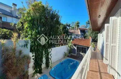 Casa com 4 quartos à venda na rua josé pedro de moura, 39, jardim isabel, porto alegre, 343 m2 por r$ 890.000