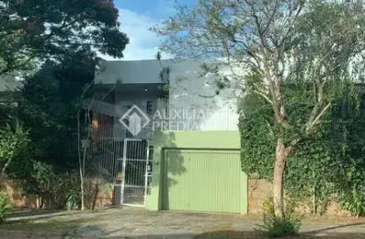 Casa com 4 quartos à venda na travessa ruperti, 50, chácara das pedras, porto alegre, 553 m2 por r$ 1.400.000