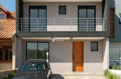 Casa em condomínio fechado com 3 quartos à venda na rua jean vardaramatos, 130, hípica, porto alegre, 139 m2 por r$ 599.000