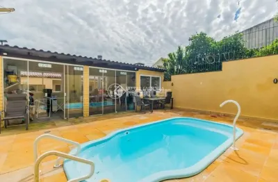Casa com 3 quartos à venda na rua lloyd de andrade polidoro, 55, ipanema, porto alegre, 239 m2 por r$ 767.125