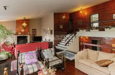 Casa com 3 quartos à venda na rua senador annibal di primio beck, 235, boa vista, porto alegre, 252 m2 por r$ 1.180.000