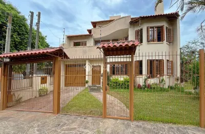 Casa com 3 quartos à venda na Avenida Guaíba, 2680, Serraria, Porto Alegre, 257 m2 por R$ 1.390.000