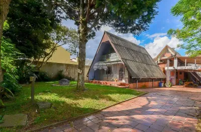 Casa com 4 quartos à venda na rua américo mattei, 423, tarumã, curitiba, 321 m2 por r$ 850.000