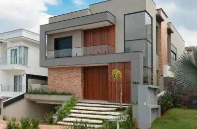 Casa à venda em santana de parnaíba, alphaville, com 4 suítes, com 480 m², gêneses i