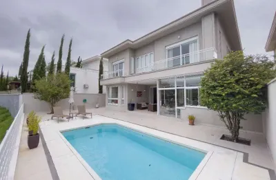 Casa à venda em santana de parnaíba, alphaville, com 4 suítes, com 427 m², gênesis 1