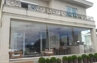 Casa à venda em santana de parnaíba, alphaville, com 3 suítes, com 400 m², gênesis 1