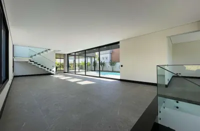Casa à venda em santana de parnaíba, alphaville, com 4 suítes, com 566 m², gênesis 2