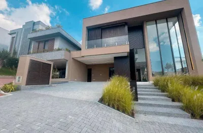 Casa à venda em santana de parnaíba,  alphaville, com 4 suítes, com 411 m², gênesis 2