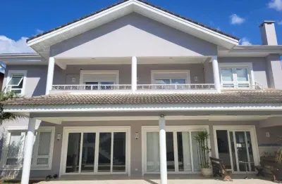 Casa à venda e para alugar em Barueri, Residencial Morada dos Lagos, com 4 suítes, com 500 m²