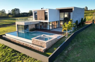 Mansão 4 suítes no riviera | 800m² | piscina, spa e sauna interligados com vista para a represa jurumirim