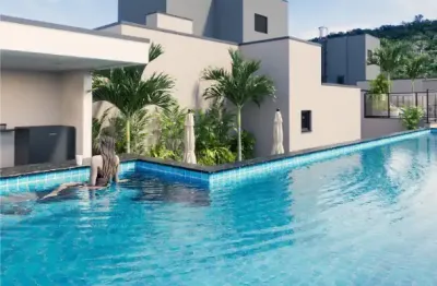 Lançamento poucos passos do mar praia das toninhas 1 e 2 suítes